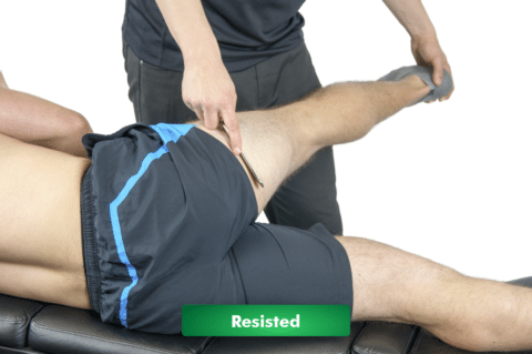 IASTM being applied to a patient whilst clinician is resisting movement.